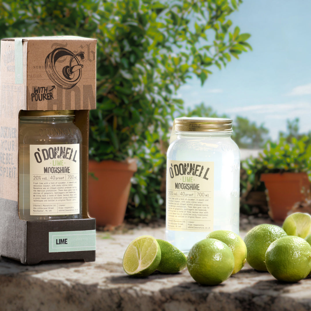 Lime moonshine next to a lime moonshine starter set