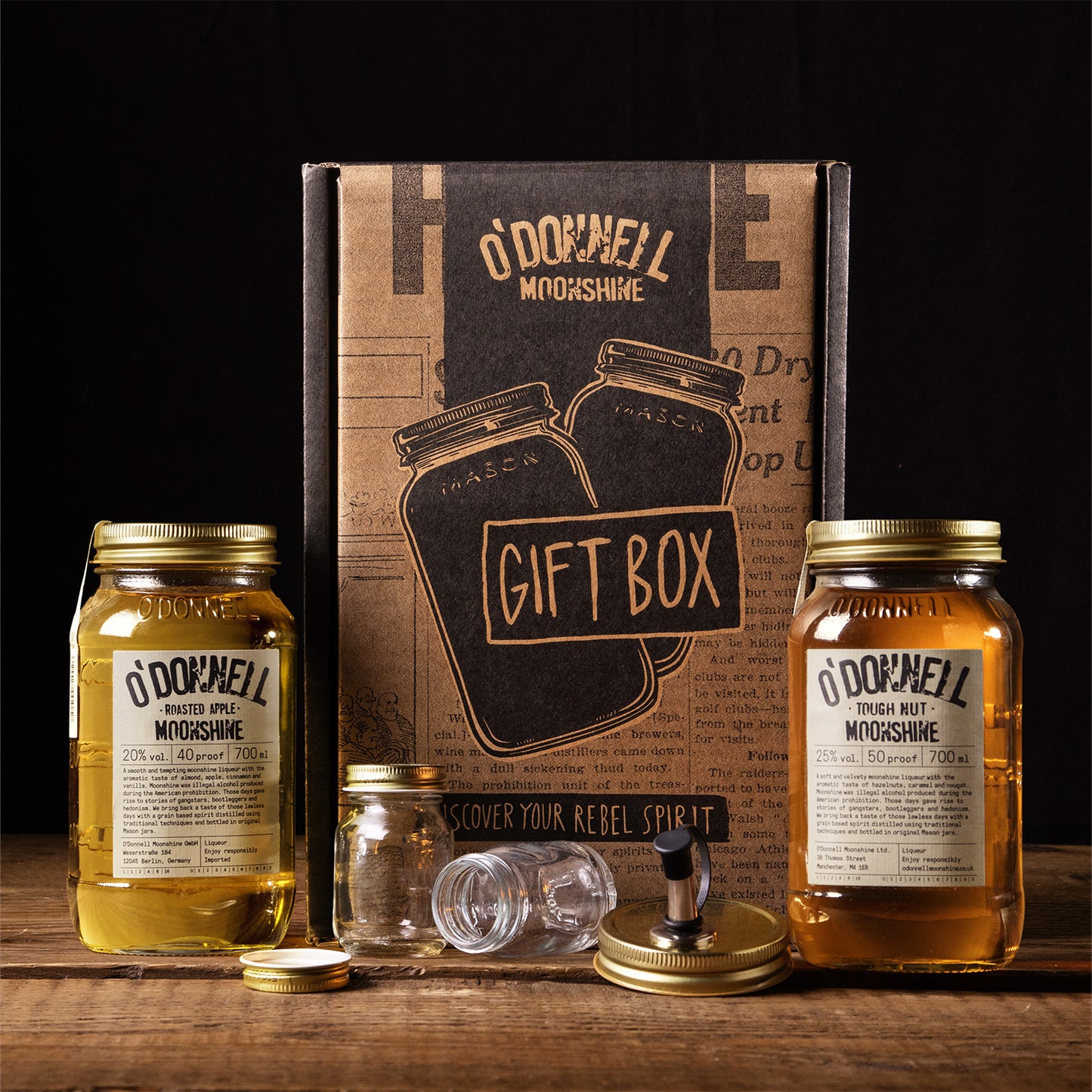 Gift Box showing 2 moonshines, two shot glasses and pouring lid