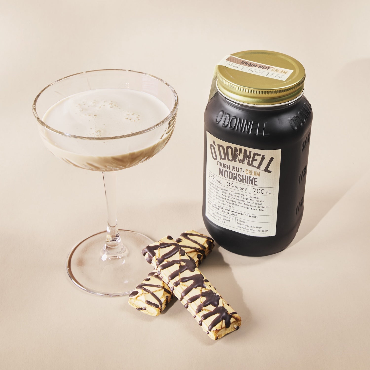 O'Donnell Moonshine Tough Nut Cream next to a cocktail