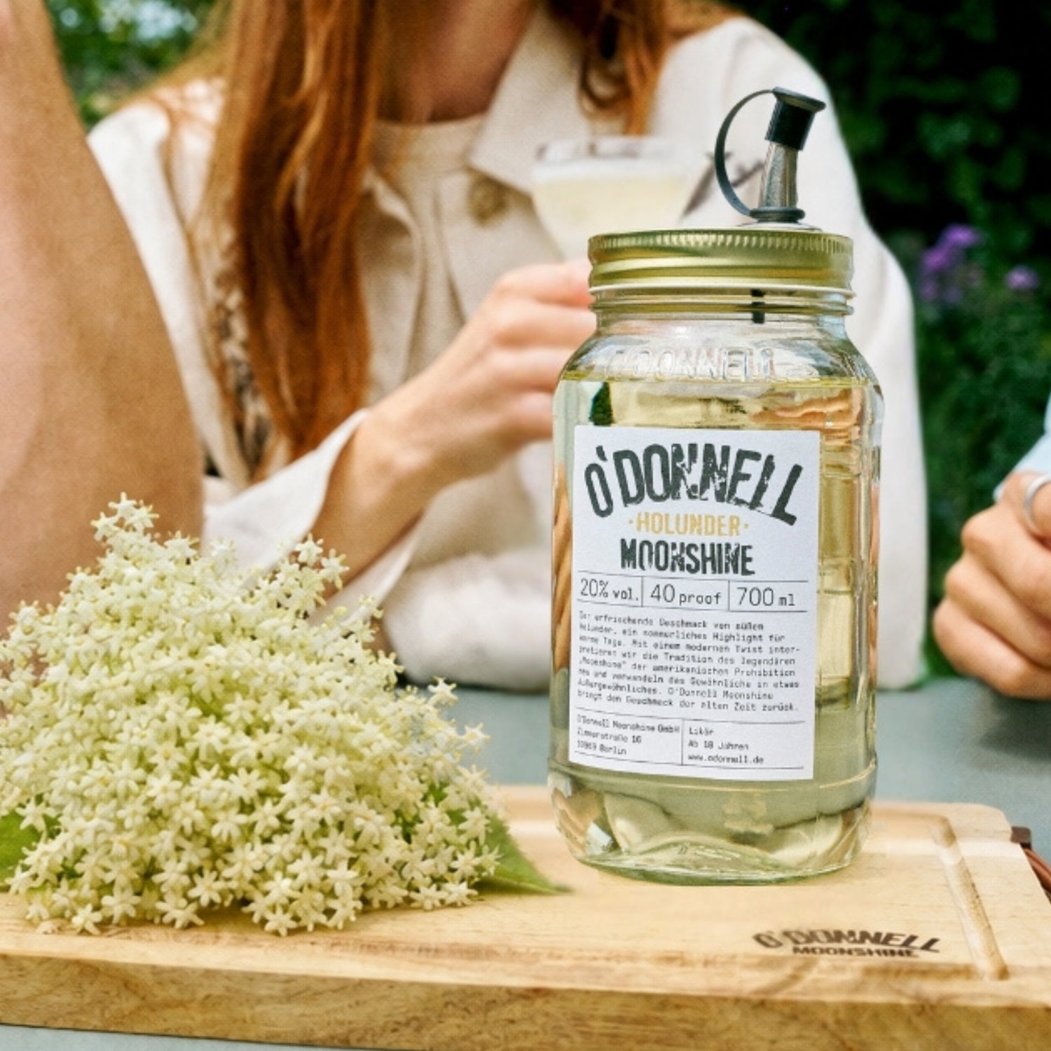 O'Donnell Moonshine Elderflower, presented in a 700ml Mason jar, features ripe elderflowers.