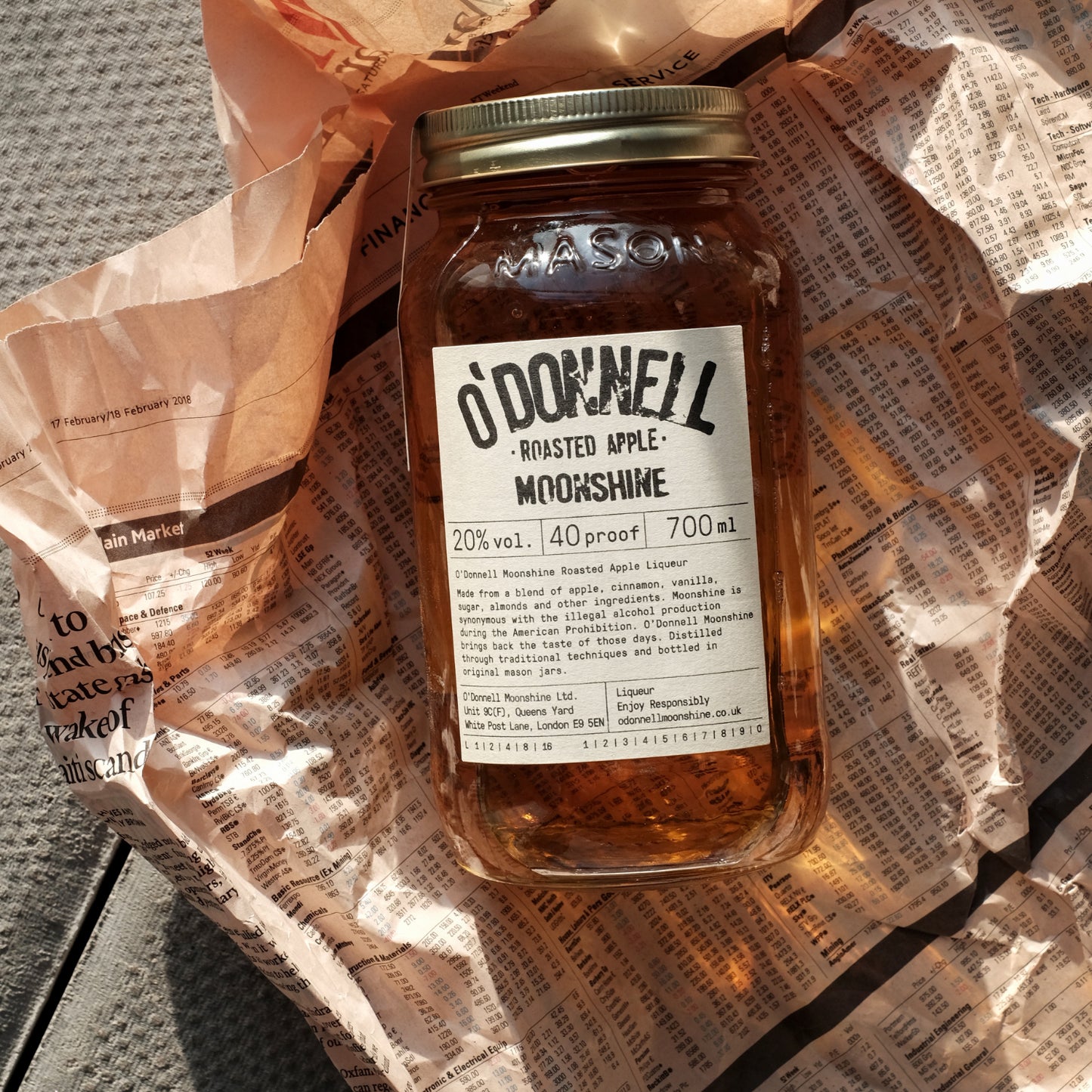 O'Donnell Moonshine Roasted Apple mood shot in sunlight