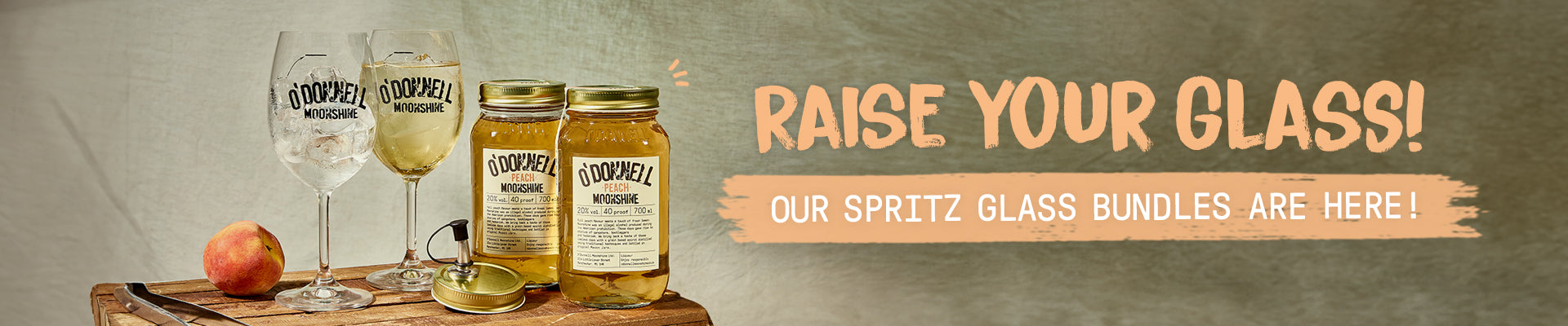 Promotional banner for spritz glass bundles with glasses, jars, and text on a rustic background.