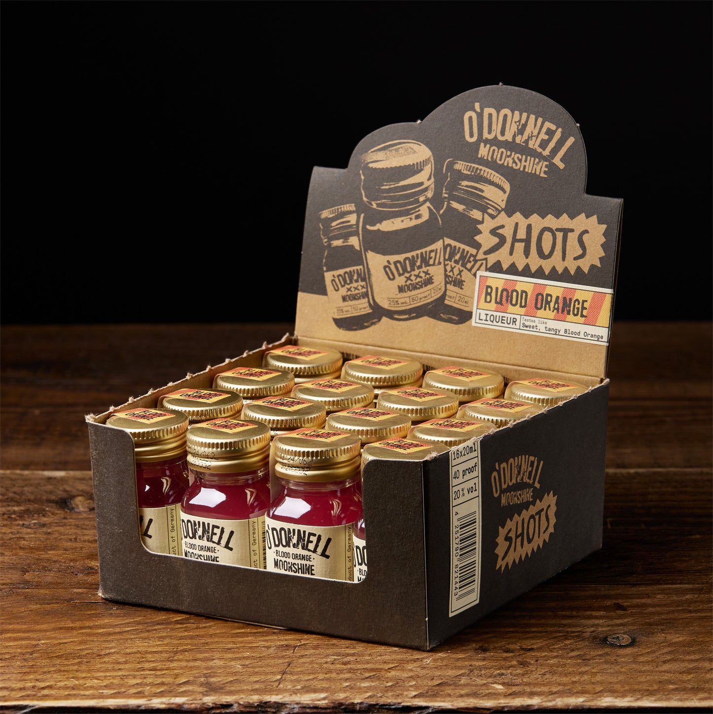 A box of O'Donnell Micro Moonshine shots displayed on a wooden surface - flavour blood orange