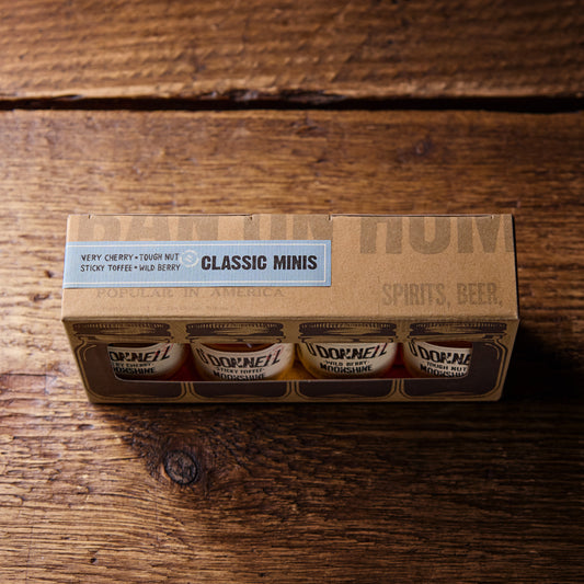O'Donnell Moonshine Classic Minis collection. 4 x 50ml minis in Tough Nut, Sticky Toffee, Wild Berry and Very Cherry flavours. 