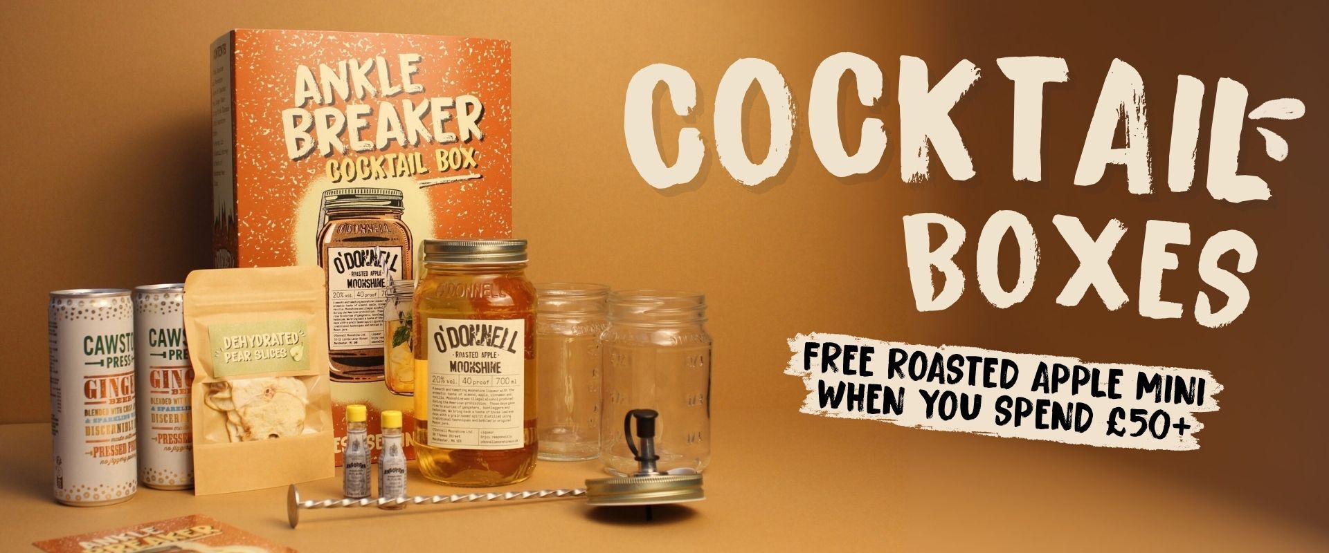 Cocktail Boxes, Free roasted apple when you spend £50+. Cocktail box ankle breaker shown on an orange background