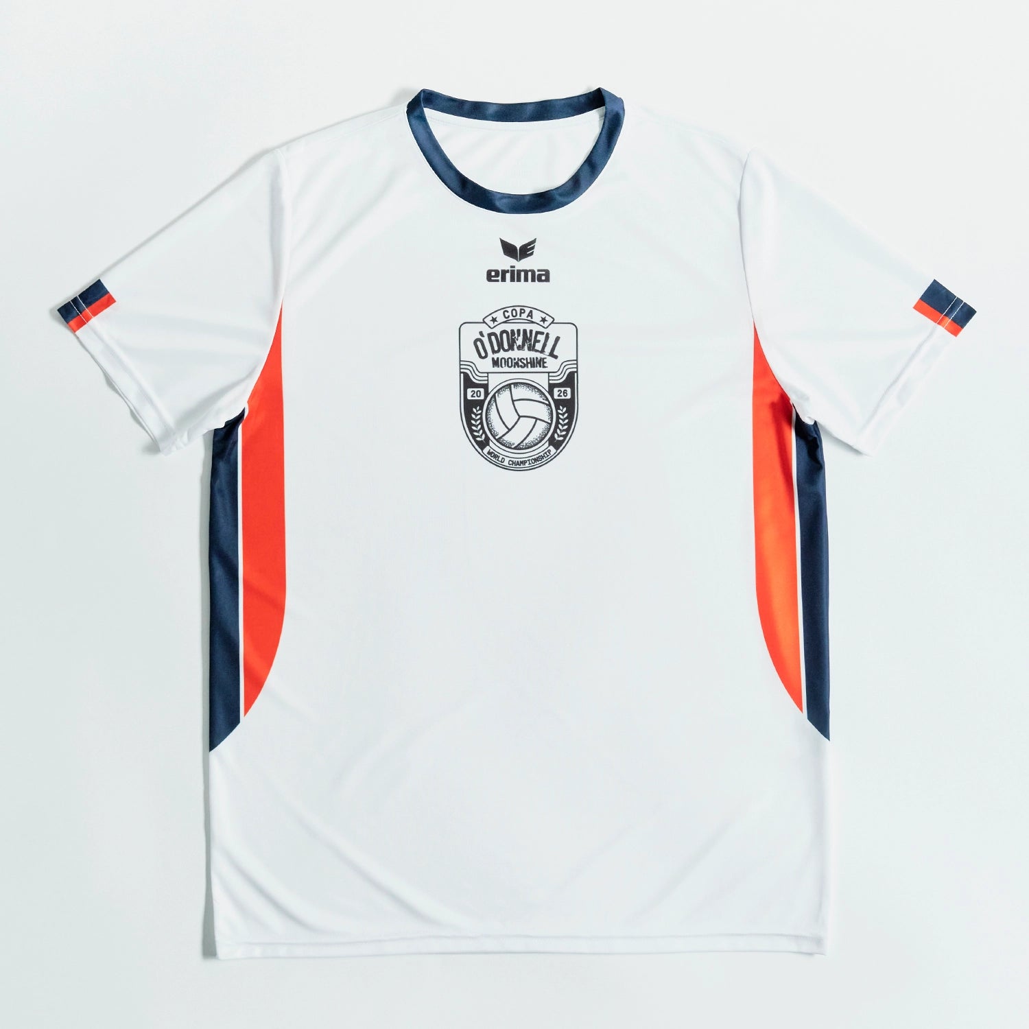 O'Donnell Moonshine WM Football Jersey – front flat lay showing Erima x O'Donnell Moonshine badge, orange side stripes and navy trim, white background