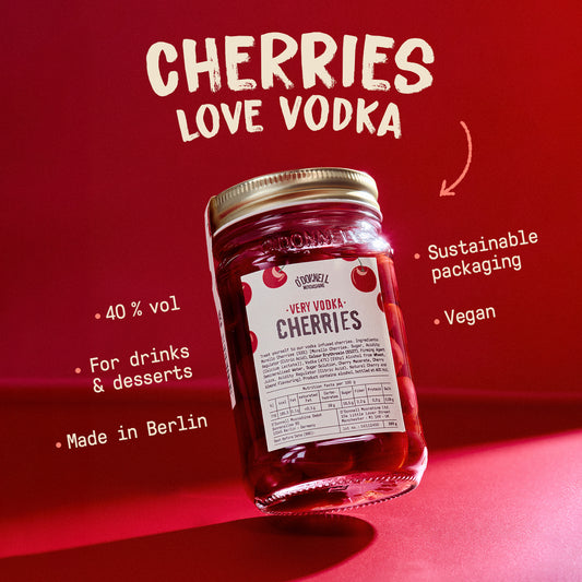 Jar of O'Donnell Very Vodka Cherries on a red background. With text; Vegan, Sustainable packaging, made in berlin, for drinks and desserts, 40% vol.