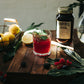 Wild Berry on a table in the sun with a cocktail