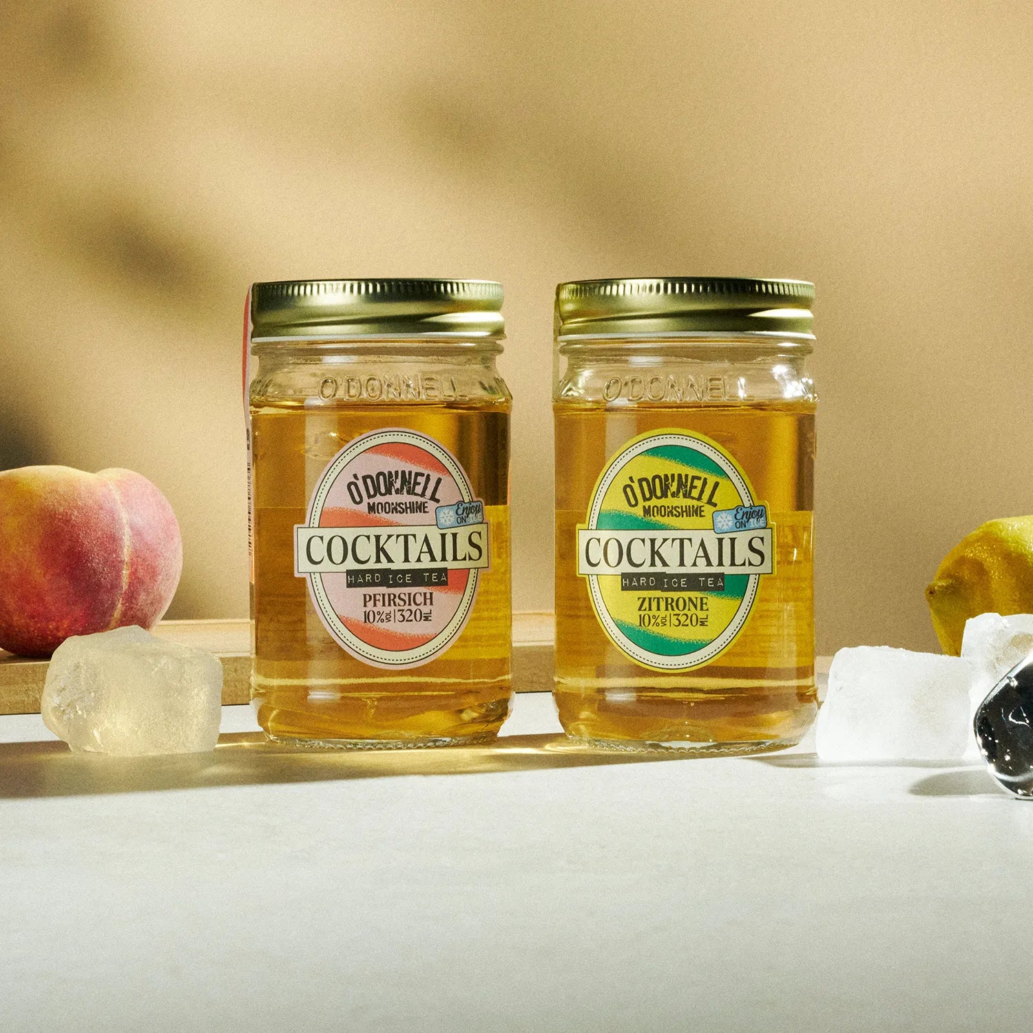 O'Donnell Moonshine RTD Cocktails Peach and Lemon jars on table with ice and fruit, Ready to Drink mobile LP banner