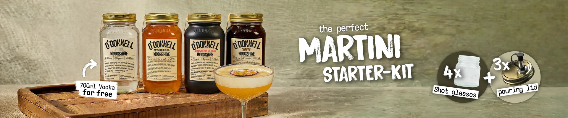 Promotional desktop banner for O'Donnell Moonshine displaying four 700ml mason jars: Vodka, Passion Fruit, Strawberries & Cream, and Coffee next to a passion fruit cocktail. Text reads "the perfect MARTINI STARTER-KIT", with callouts for "700ml Vodka for free", "4x Shot glasses", and "3x pouring lid".
