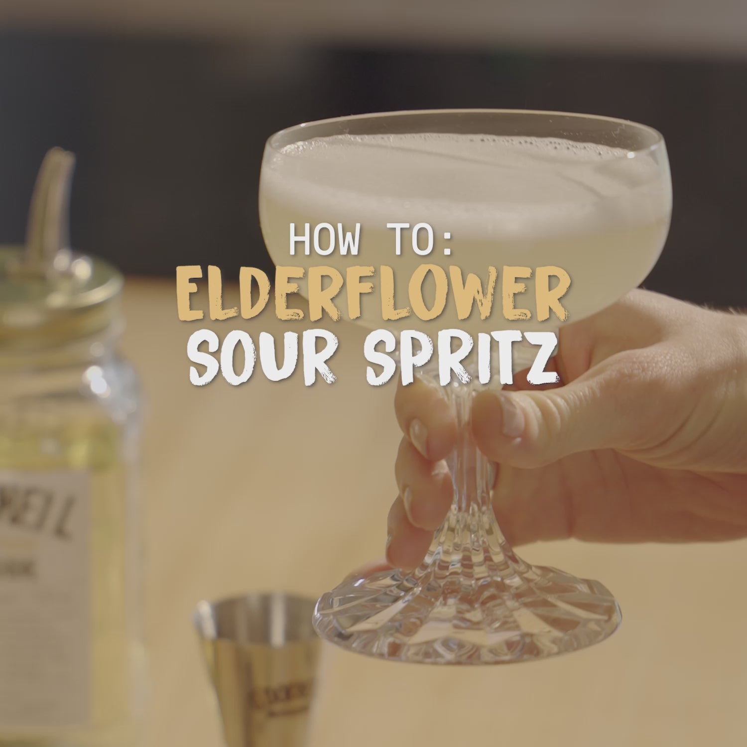 The video provides a step-by-step guide to making an Elderflower Sour Spritz cocktail using O'Donnell Moonshine Elderflower.