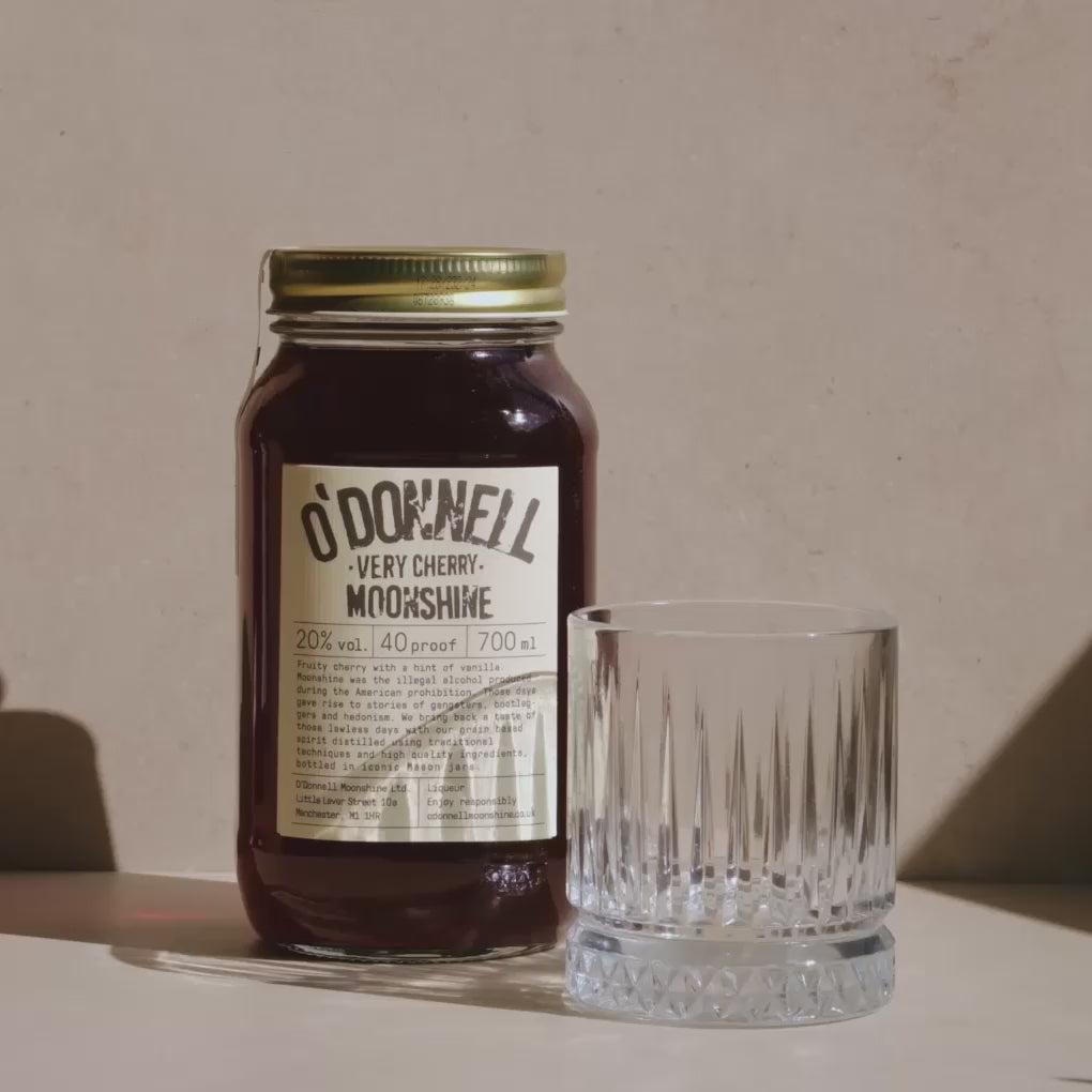 Very Cherry Moonshine being poured into a glass