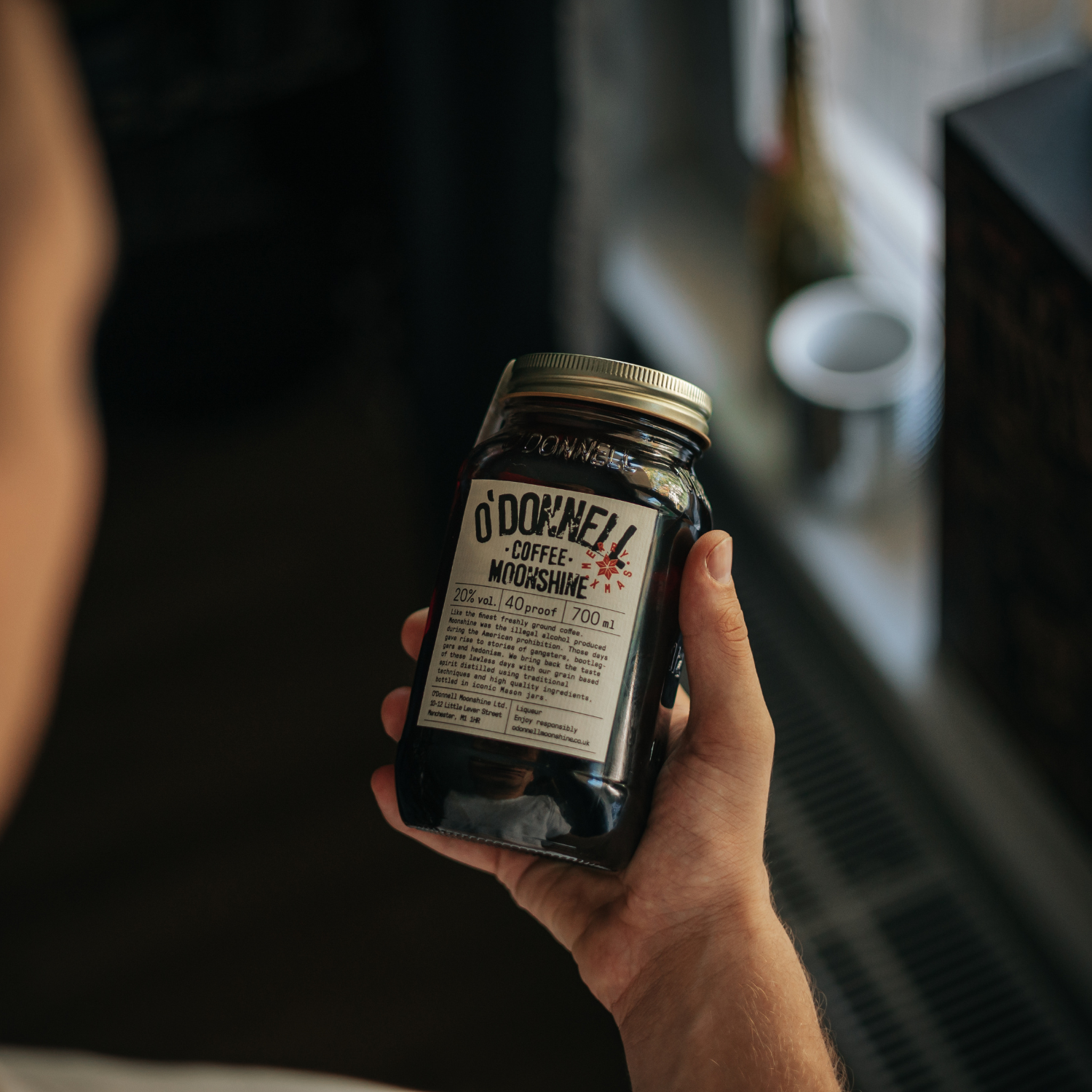Holding Coffee Moonshine