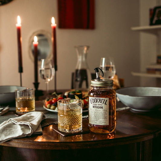 sticky toffee cocktail long drink on dining table